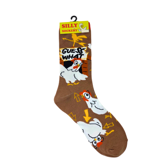 Silly Goose Sock with cartoon roosters and 'Guess What?' text on a brown background, with packaging above.