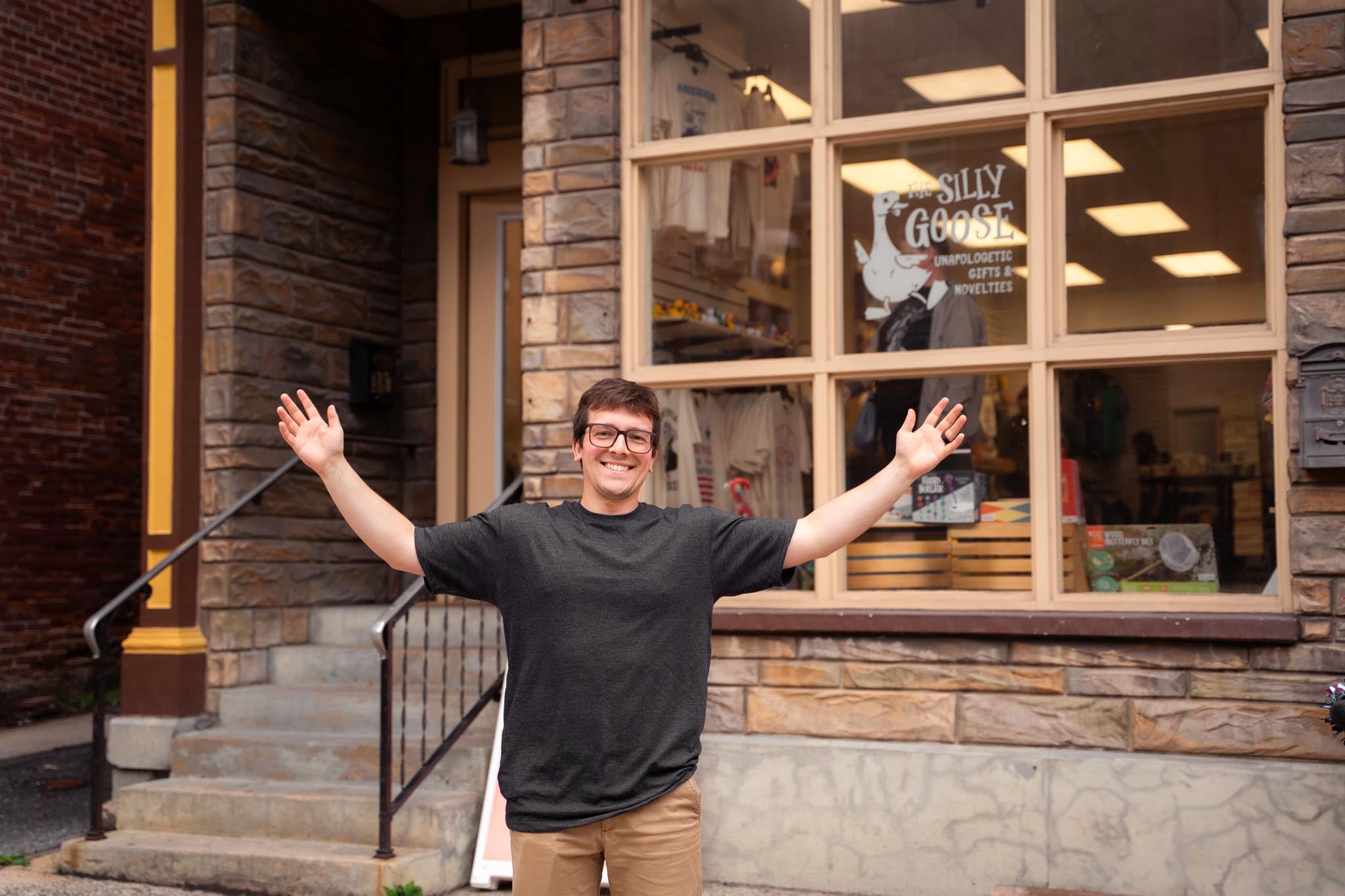 Nate from "The Silly Goose" standing outside "The Silly Goose Unapologetic Gifts & Novelties" in Jim Thorpe