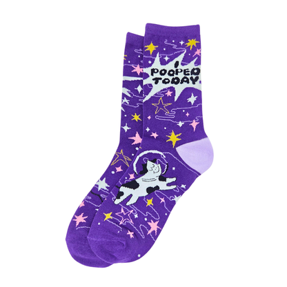 Silly Goose Purple sock with cartoon cow and 'Pooped Today' text on a white background