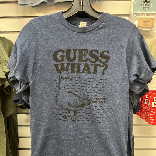 Gray t-shirt with a goose graphic and text 'Guess What?' on a hanger.