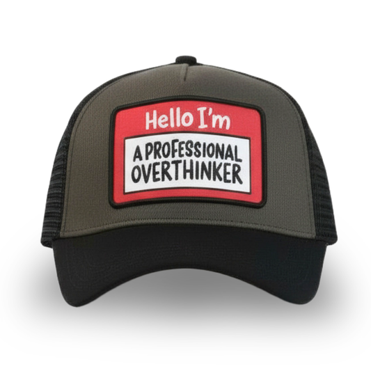 Silly Goose Trucker hat with a patch that reads 'Hello I'm a Professional Overthinker' on a white background