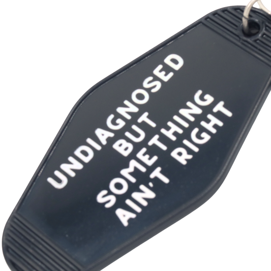 Something Ain't Right Motel Keychain
