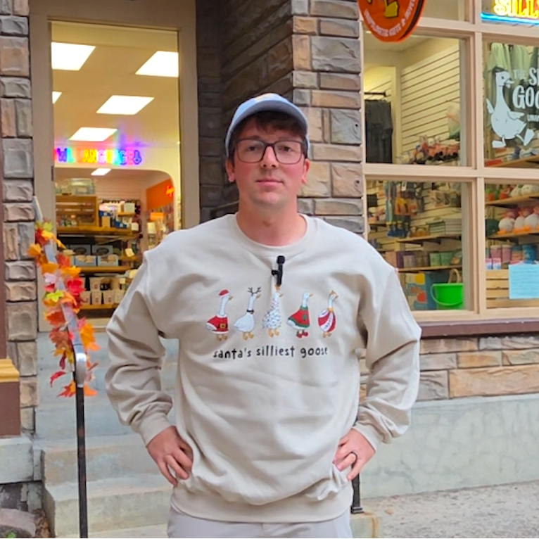 Nate from The Silly Goose in Jim Thorpe wearing "Santa's silliest goose" sweatshirt.